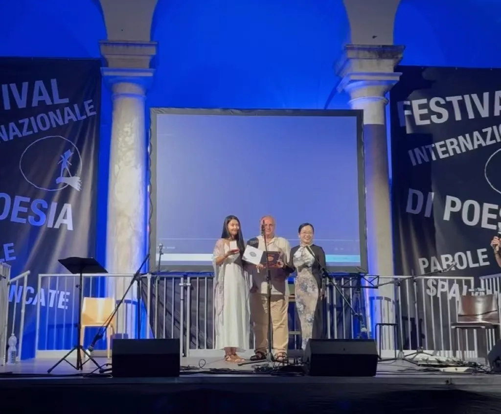 Poets gathered on stage at Palazzo Ducale during the Genoa International Poetry Festival