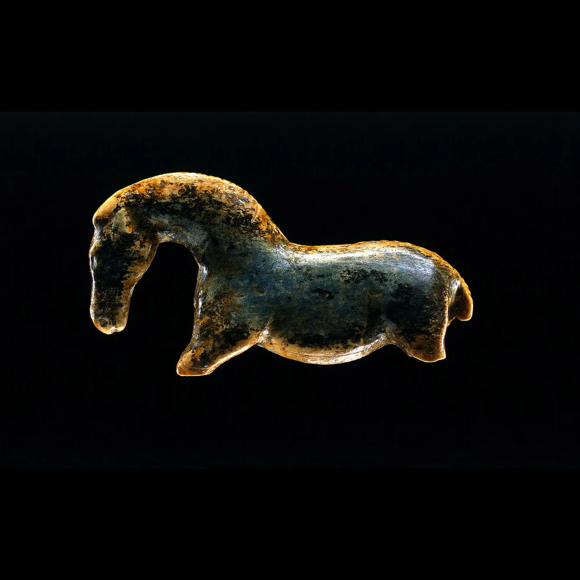 The ancient Vogelherd horse figurine — inspiration for Ormiro